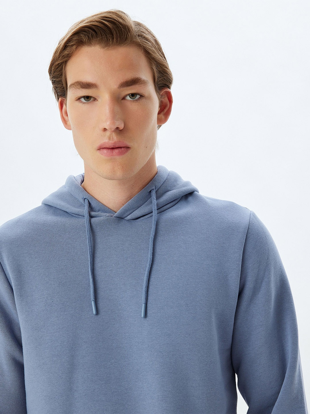 

Koton Men Solid Hood Pullover Sweatshirt, Blue