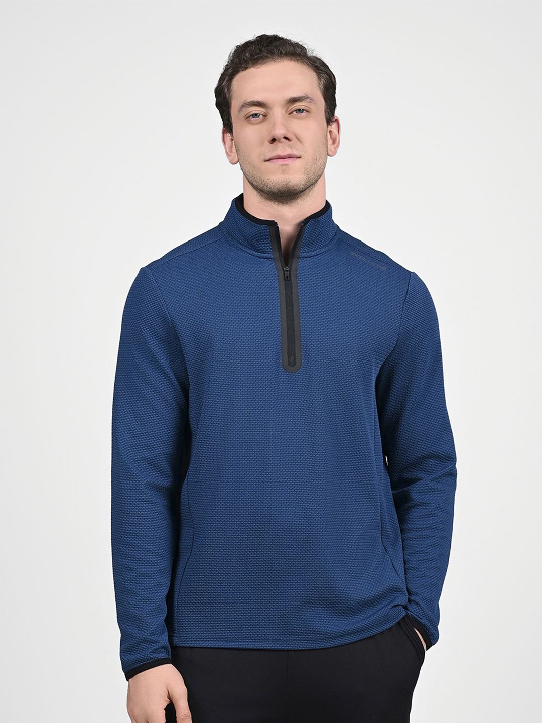 

Skechers Men Solid High Neck T-shirt, Blue
