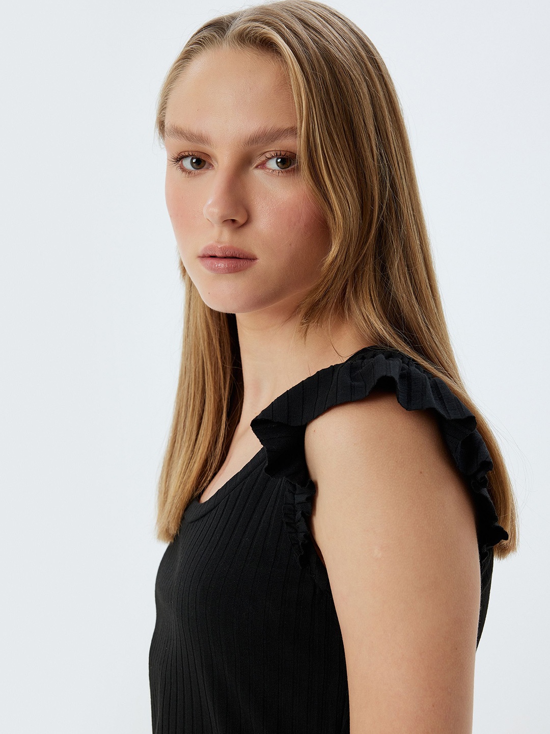 

Koton Women Solid Round Neck Cotton Top, Black
