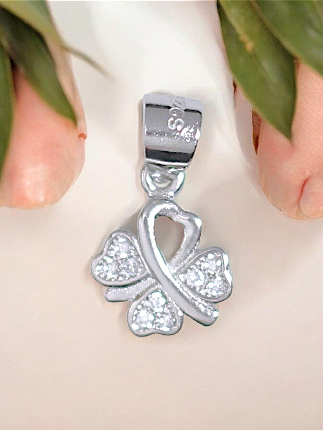 

Taraash 925 Sterling Silver Rhodium-Plated Cubic Zirconia Heart Petals Pendant