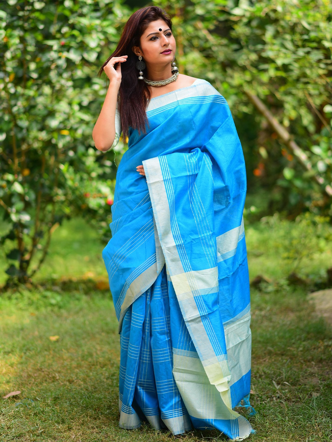 

Kandora Woven Design Zari Solid Pure Silk Saree With Unstitched Blouse Piece, Blue