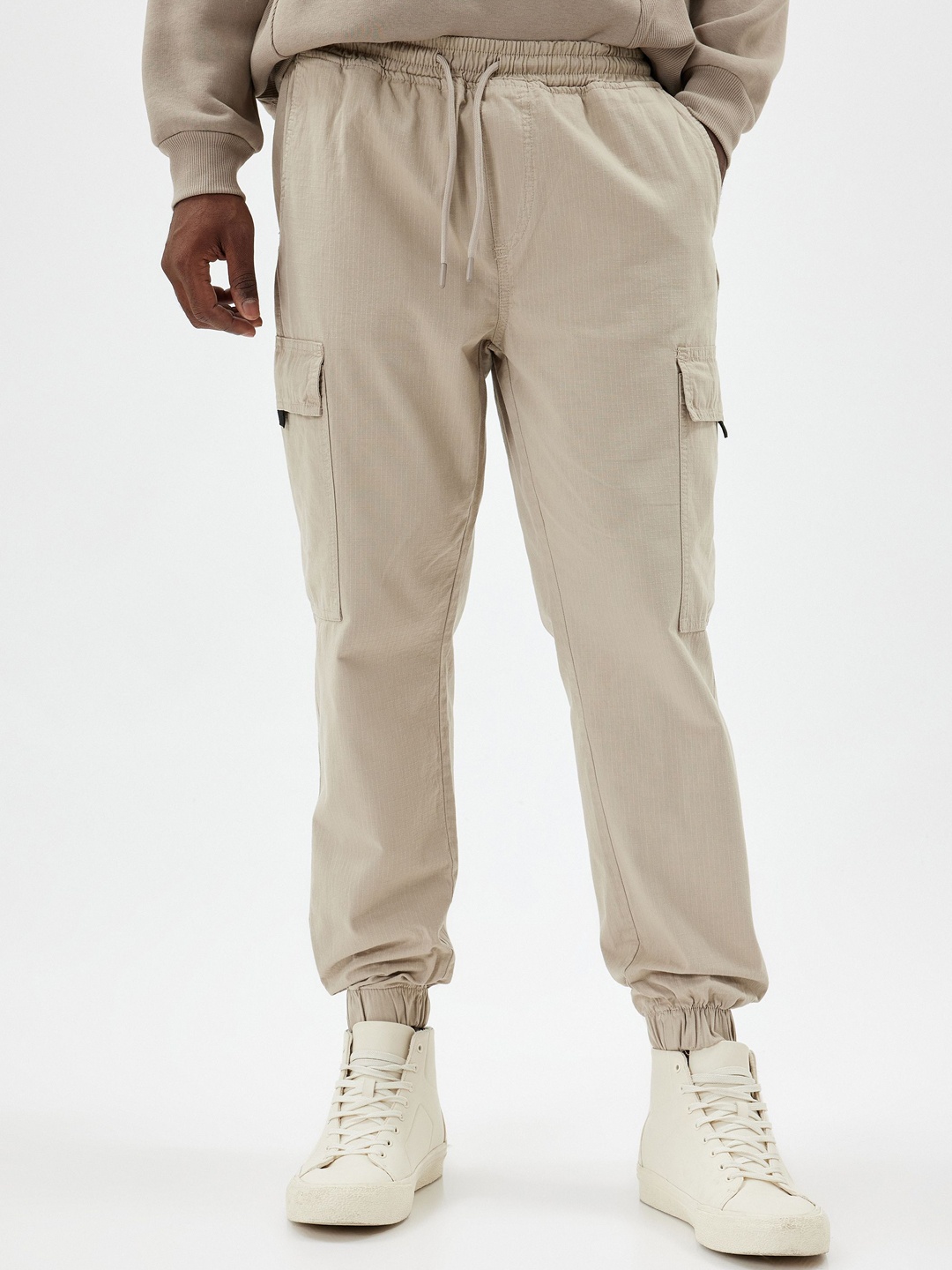 

Koton Men Mid-Rise Joggers Trousers, Beige