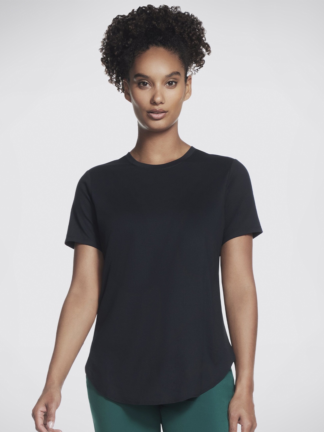 

Skechers Women Moisture Wicking Solid Round Neck T-shirt, Black