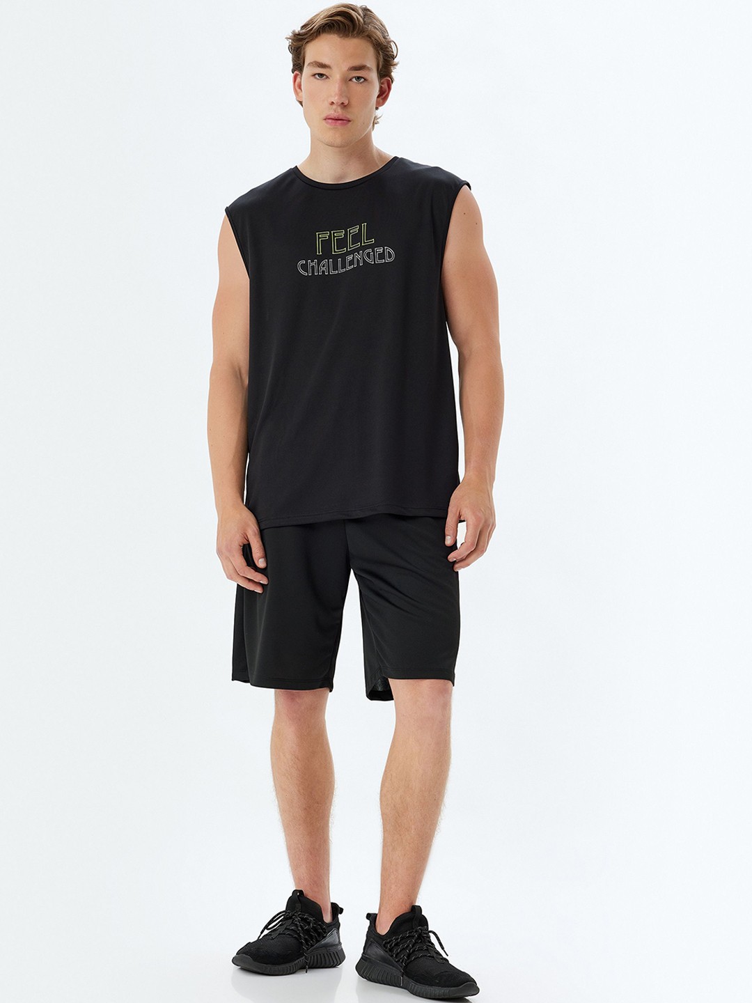 

Koton Men Regular Fit Mid-Rise Sports Shorts, Black