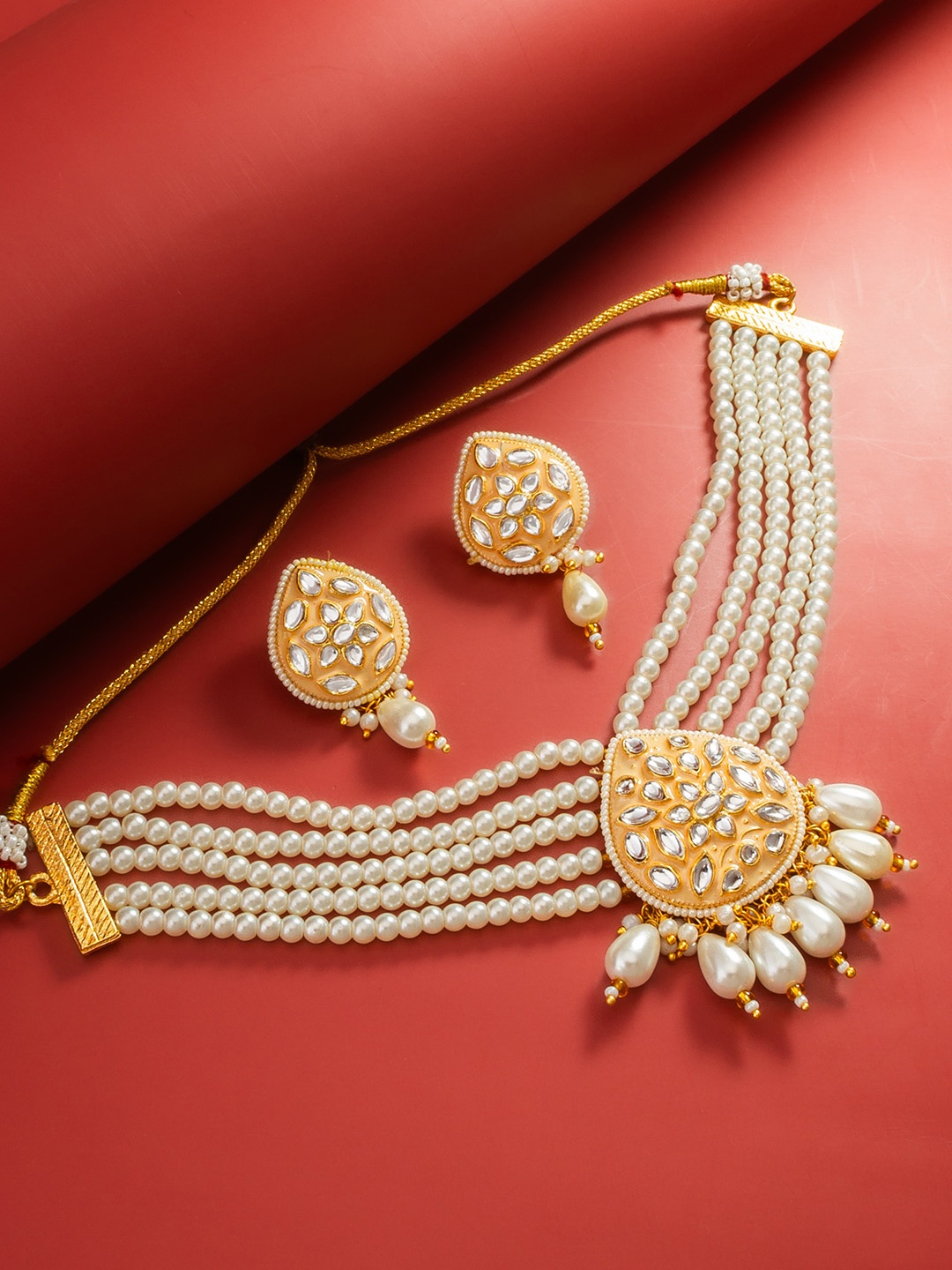 

aadita Gold-Plated Kundan-Studded & Pearls Beaded Jewellery Set