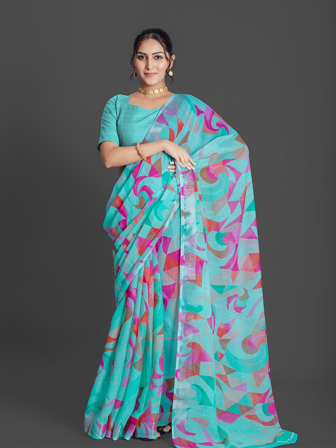 

NIRMAL CREATION Abstract Printed Zari Saree, Turquoise blue