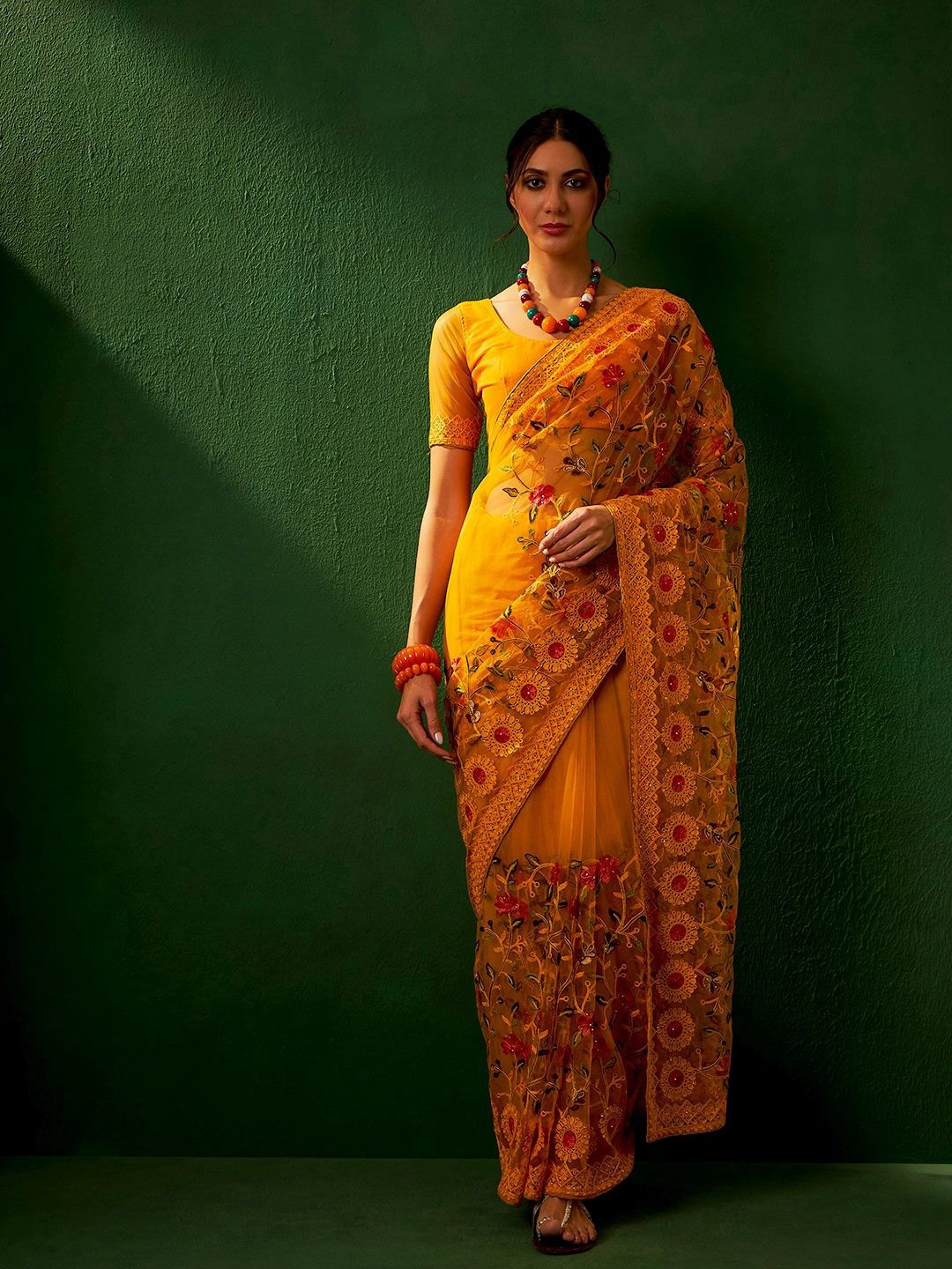 

Maroosh Embellished Beads and Stones Net Saree, Mustard