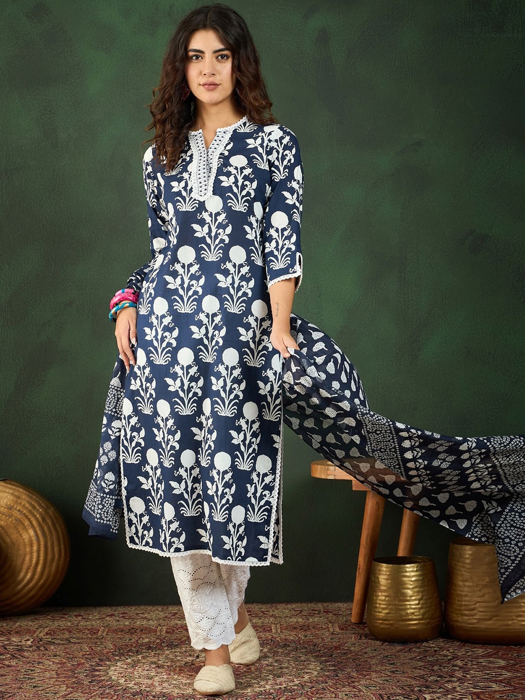 

Vastramyaa Women Floral Printed Pure Cotton Kurta with Trousers & With Dupatta, Navy blue