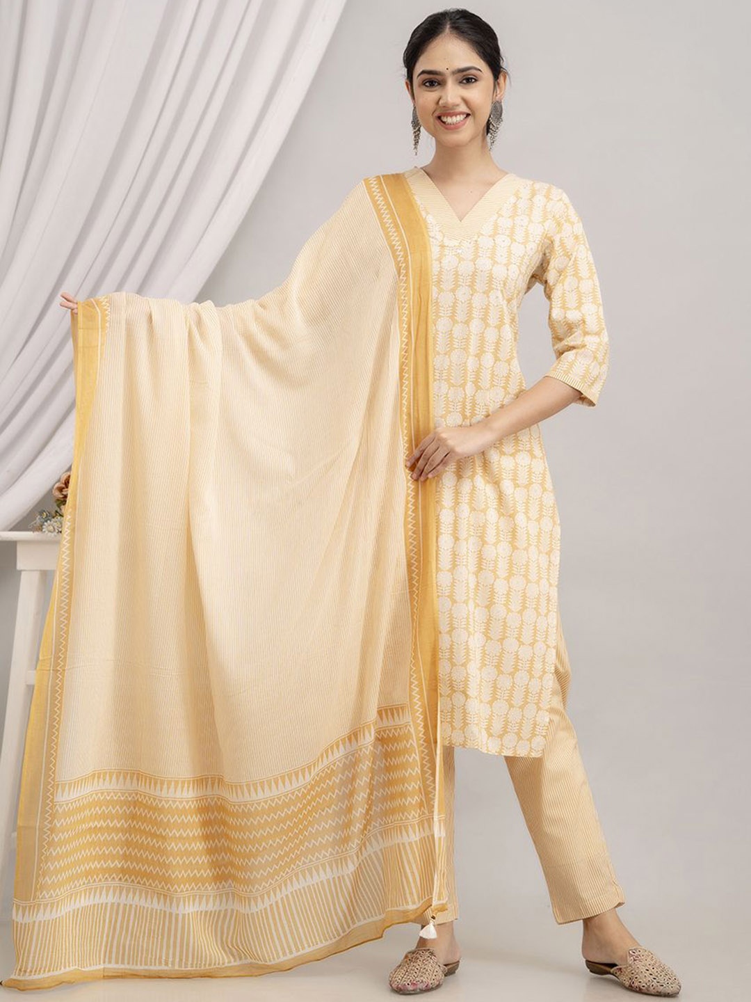 

Dastkar Women Floral Printed Regular Pure Cotton Kurta with Trousers & With Dupatta, Mustard