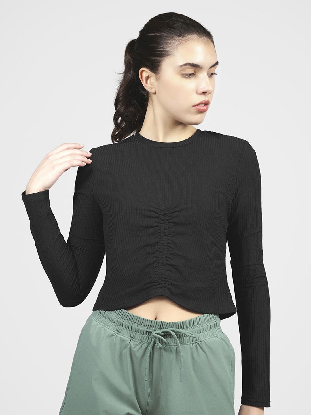 

Skechers Women Solid Round Neck Top, Black