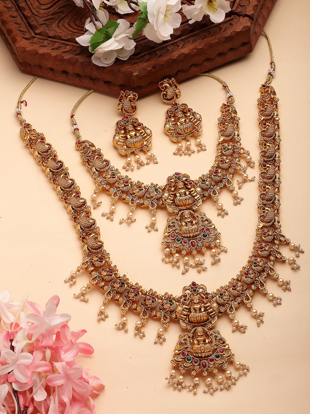 

NVR Gold-Plated Stone-Studded & Beaded Lakshmi Goddess Design Temple Jewellery Set