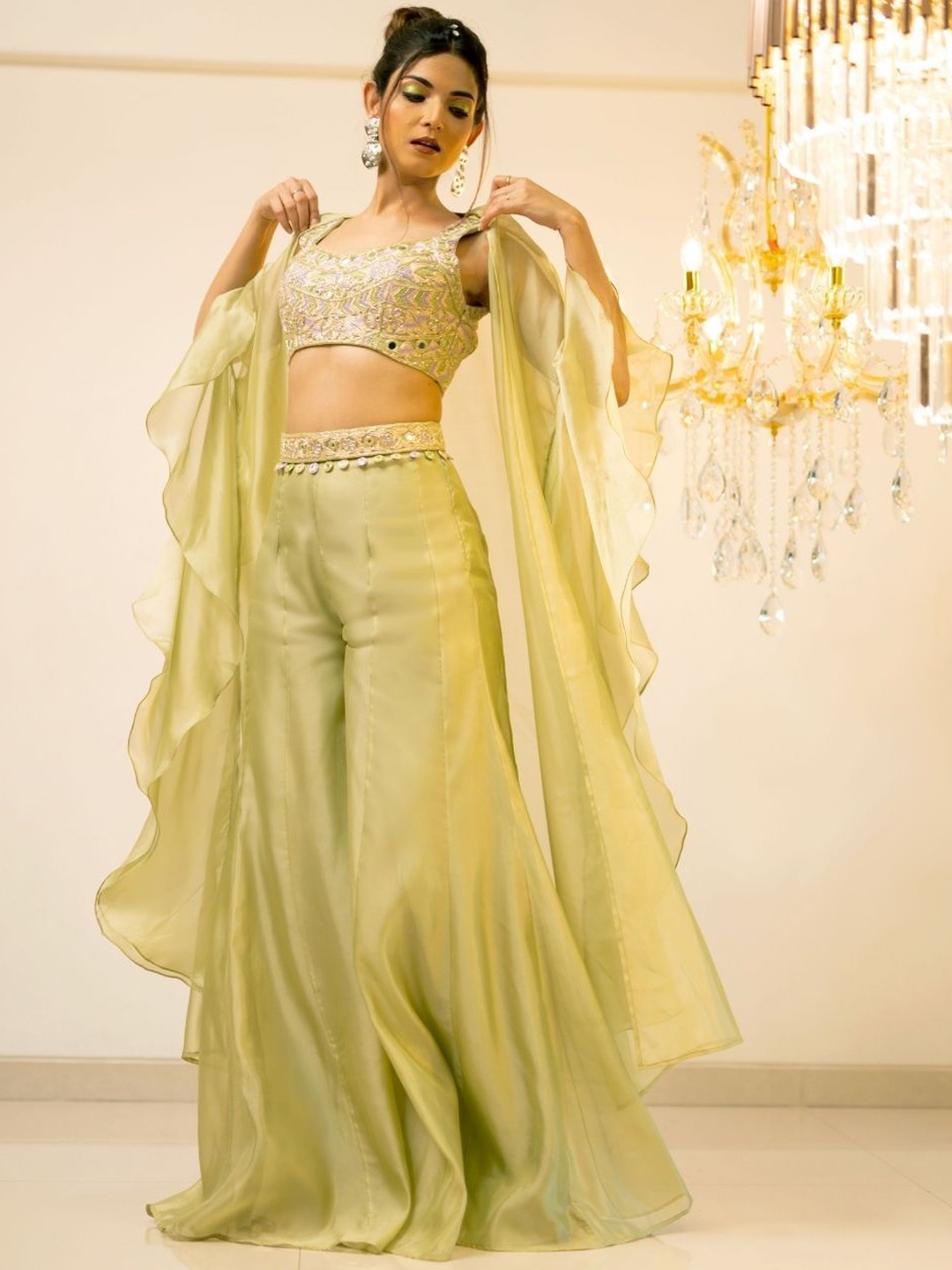 

Foram patel Green Organza Sharara Cape Set