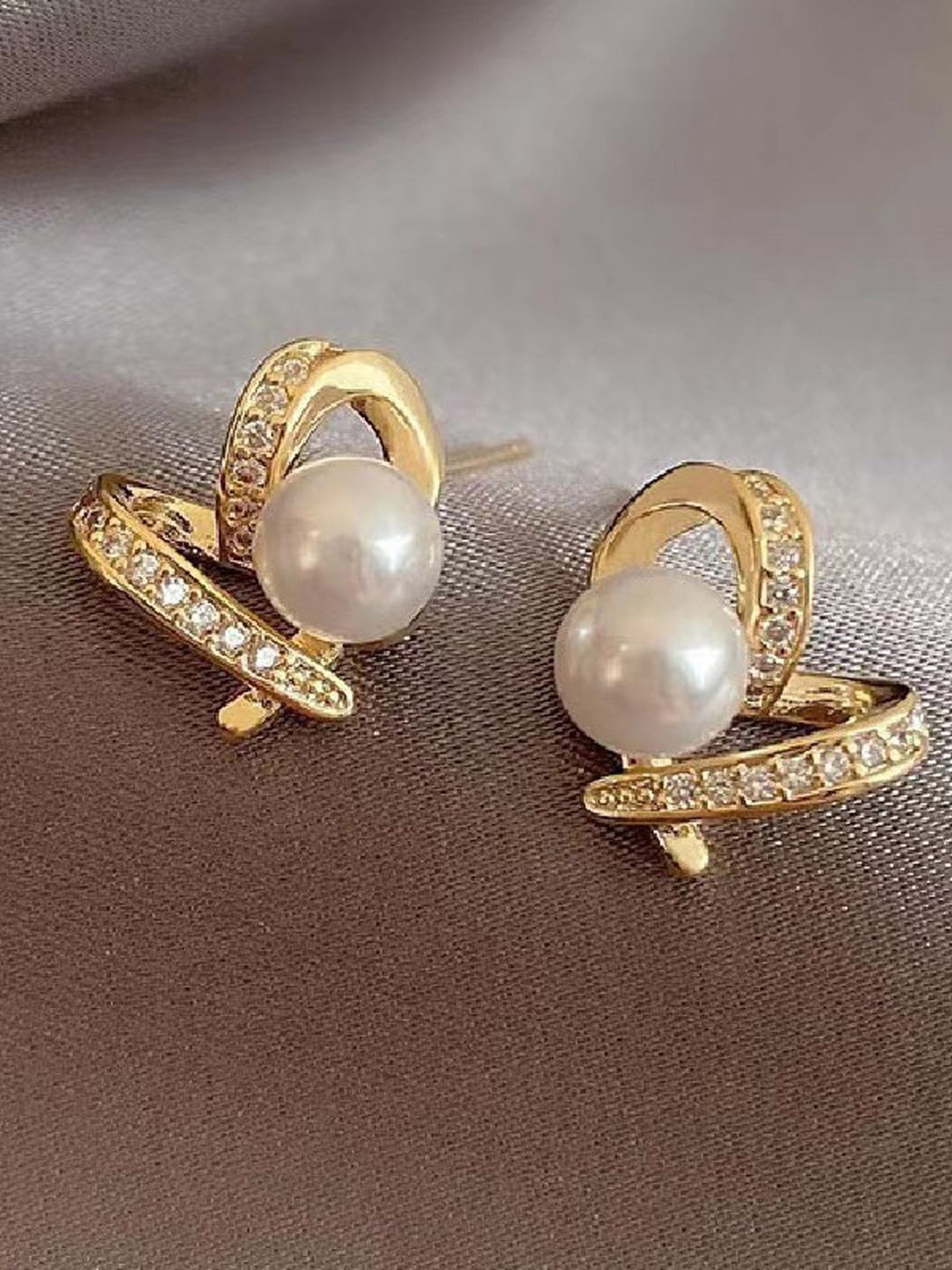 

VAGHBHATT Gold Plated Cubic Zirconia Heart Shaped Studs Earrings