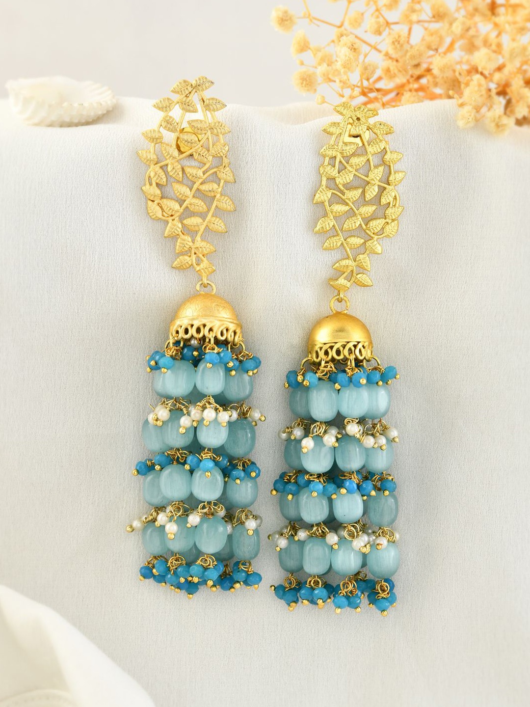 

Silvermerc Designs Gold-Plated Pearls Beaded Leaf Shaped Jhumkas