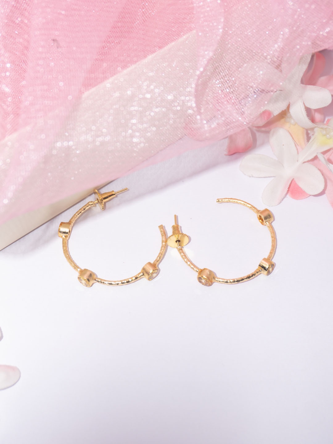 

Niscka Gold Plated American Diamond Contemporary Half Hoop Earrings