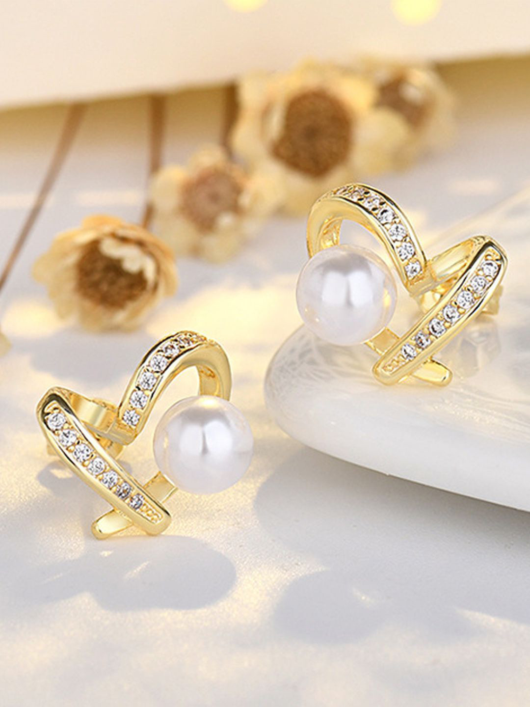 

VAGHBHATT Gold Plated Cubic Zirconia Heart Shaped Studs Earrings