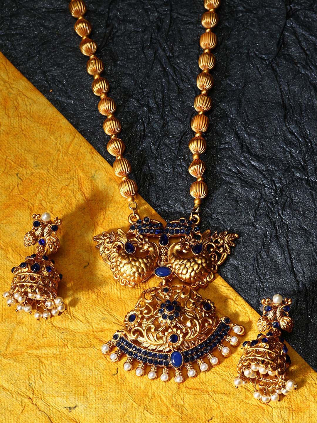 

ANIKAS CREATION Gold-Plated Stone Studded & Beaded Jewellery Set