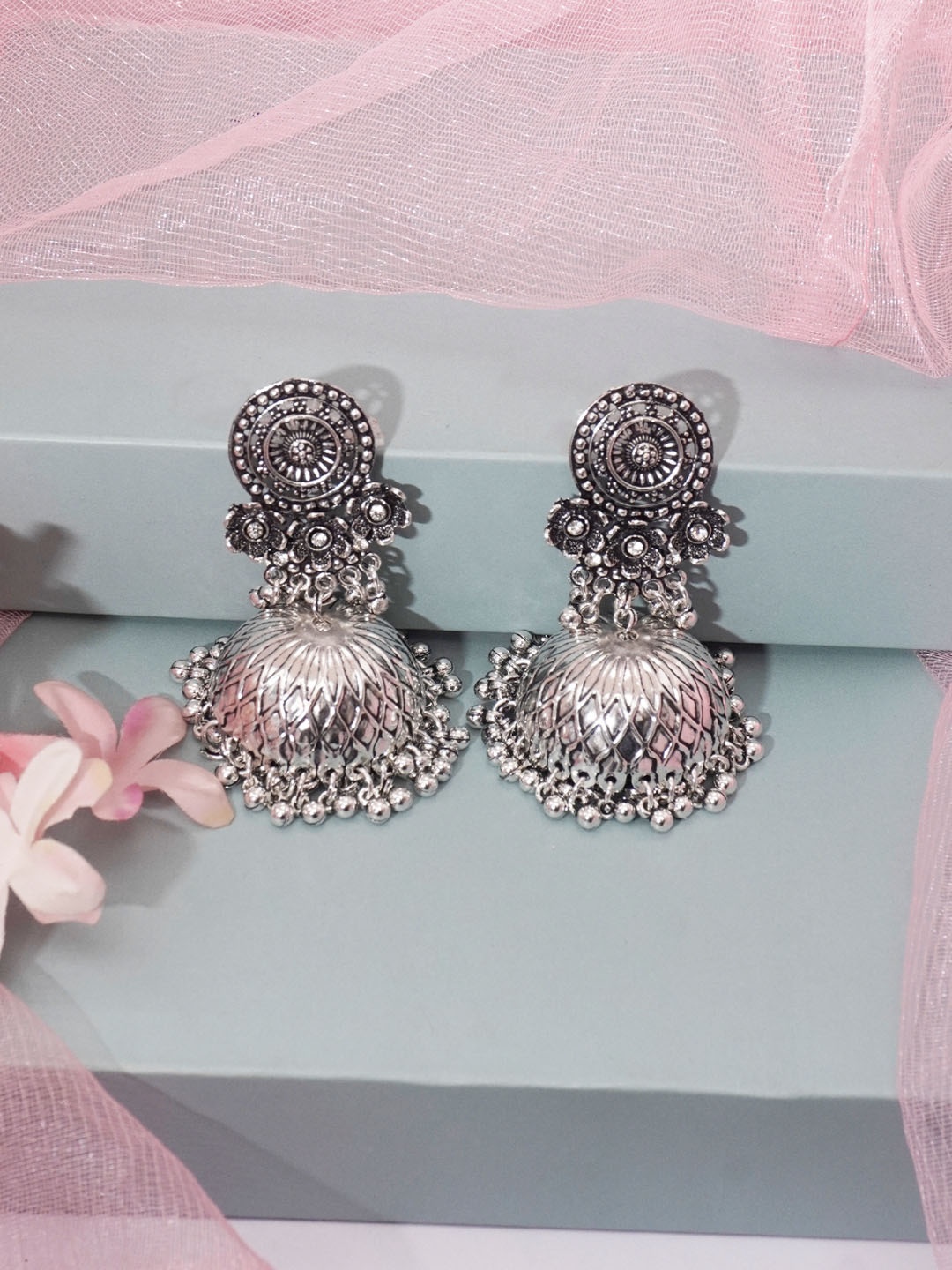 

Niscka Rhodium Plated Dome Shaped American Diamond Oxidized Jhumkas, Silver