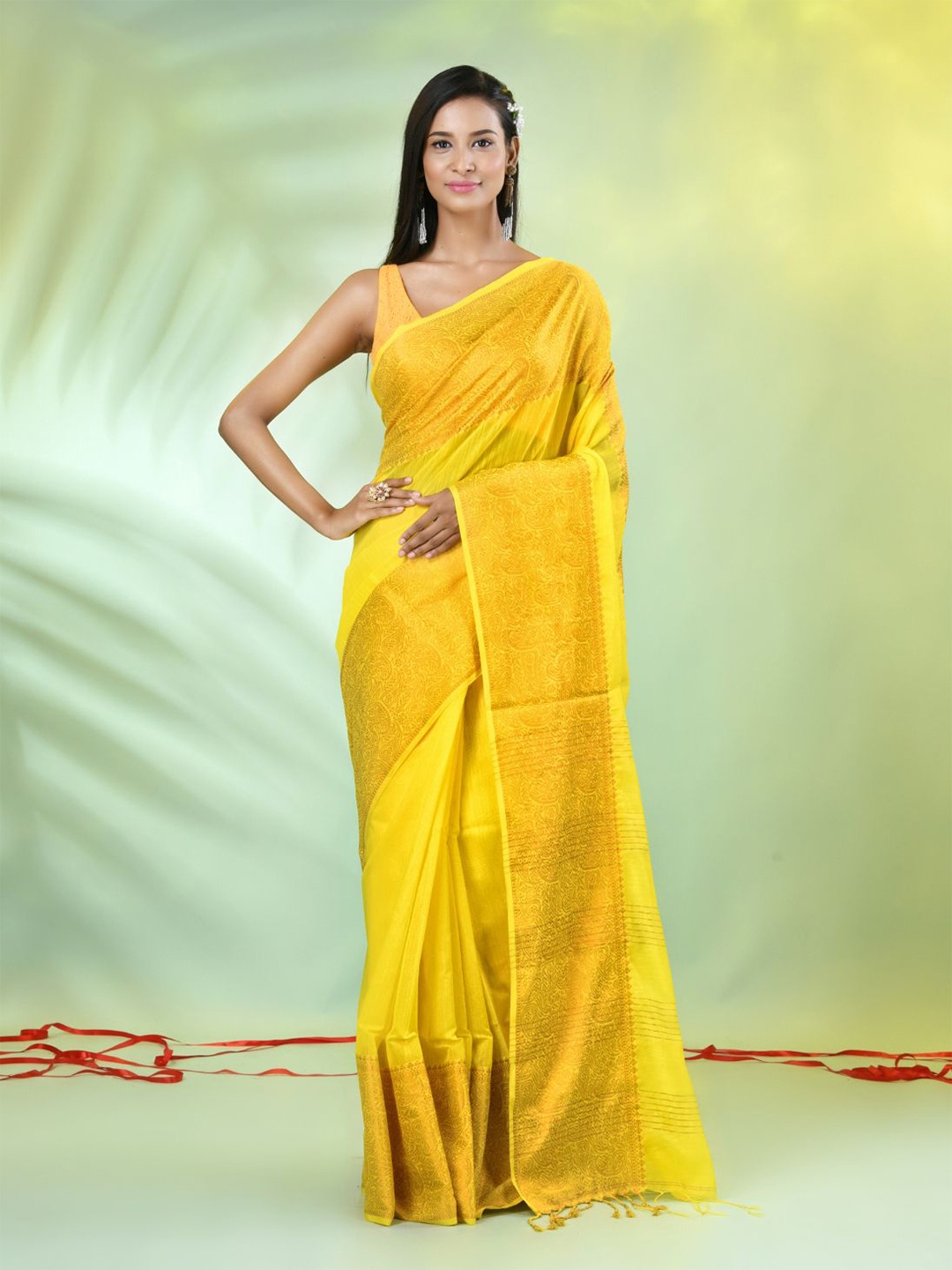 

Charukriti Woven Design Zari Solid Saree, Yellow