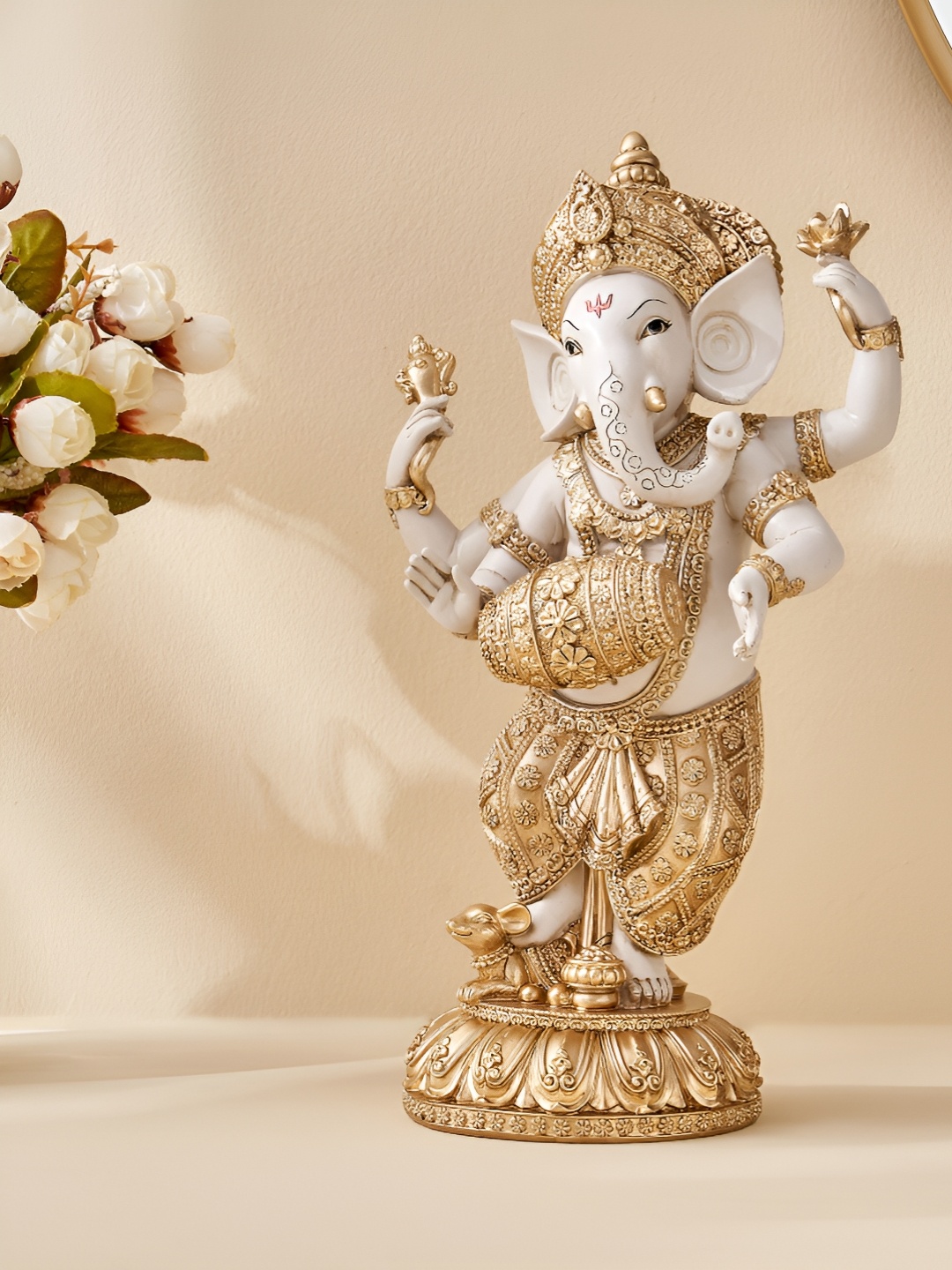 

Home Centre Beige Religious Idol Showpiece