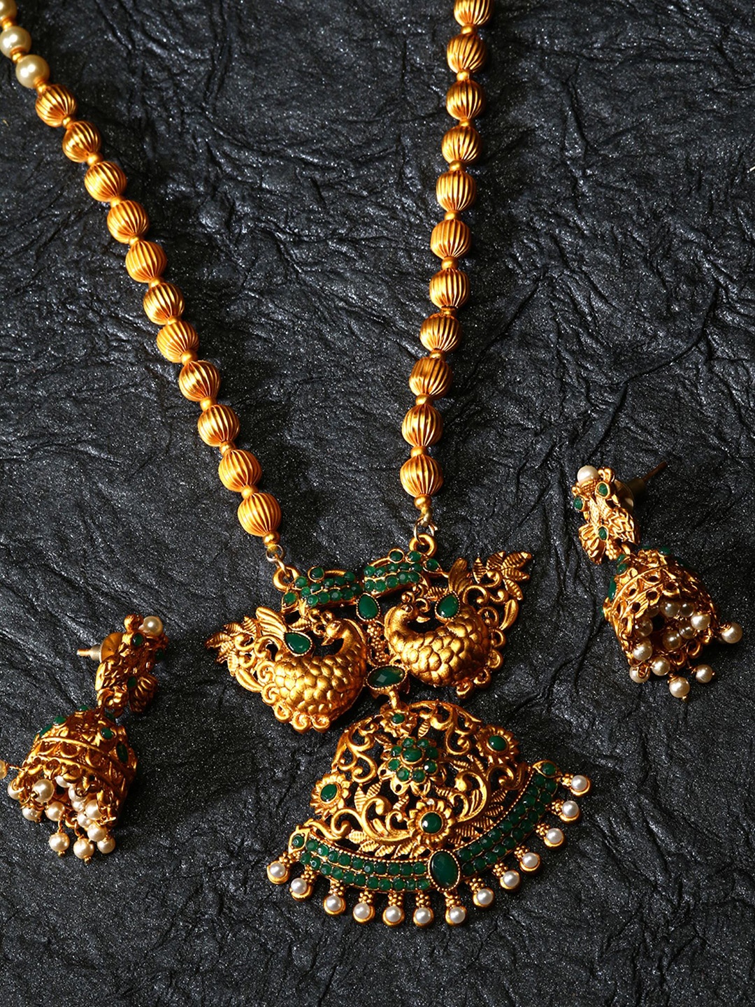 

ANIKAS CREATION Gold-Plated Stone Studded & Beaded Jewellery Set