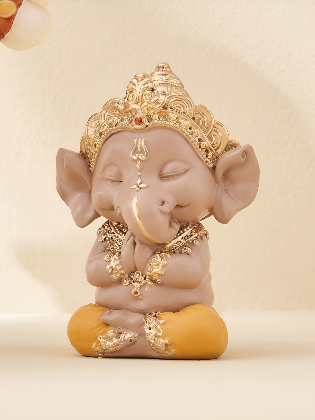 

Home Centre Beige Religious Figurine Showpiece