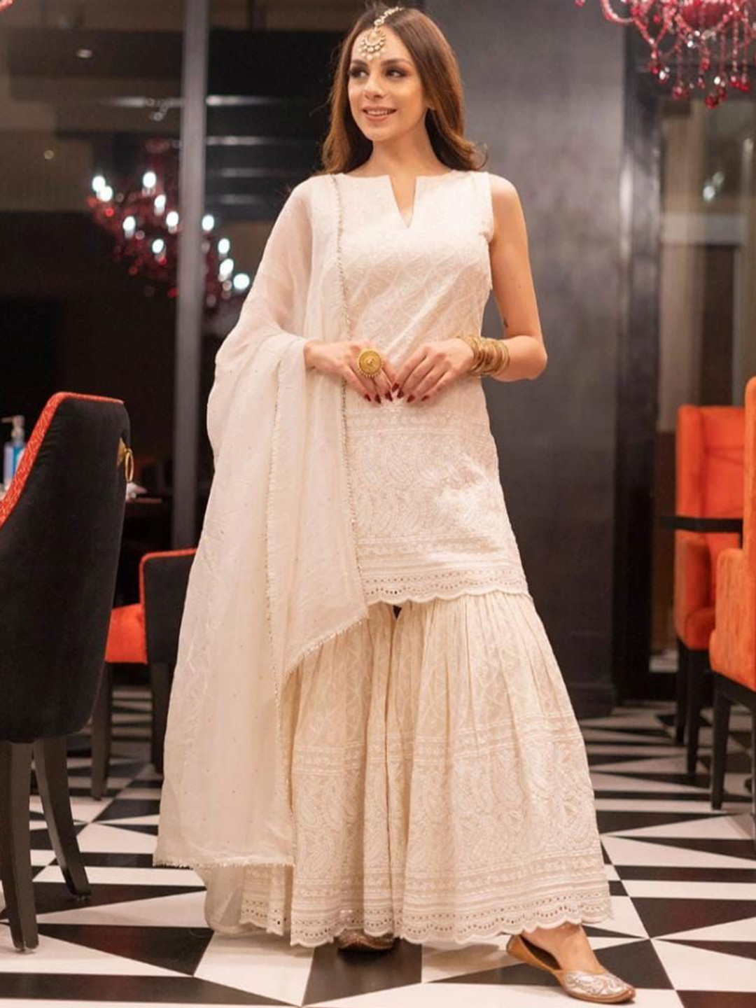 

MIRAVAN Women Ethnic Motifs Embroidered Regular Chikankari Pure Cotton Kurti with Sharara & With Dupatta, Beige