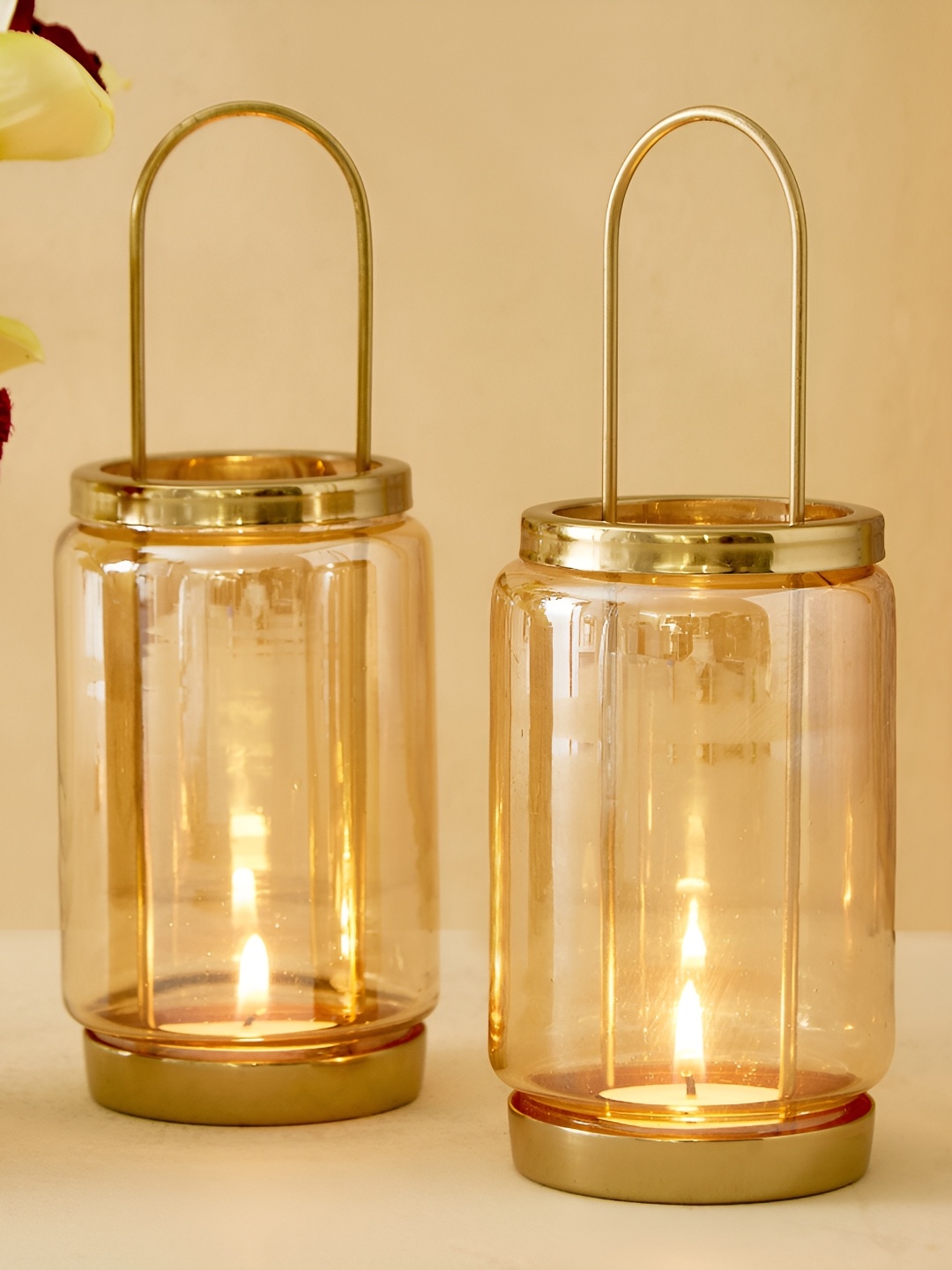 

Home Centre Raga Apurva GoldToned and Transparent 2 Pieces Glass Candle Holder, Gold