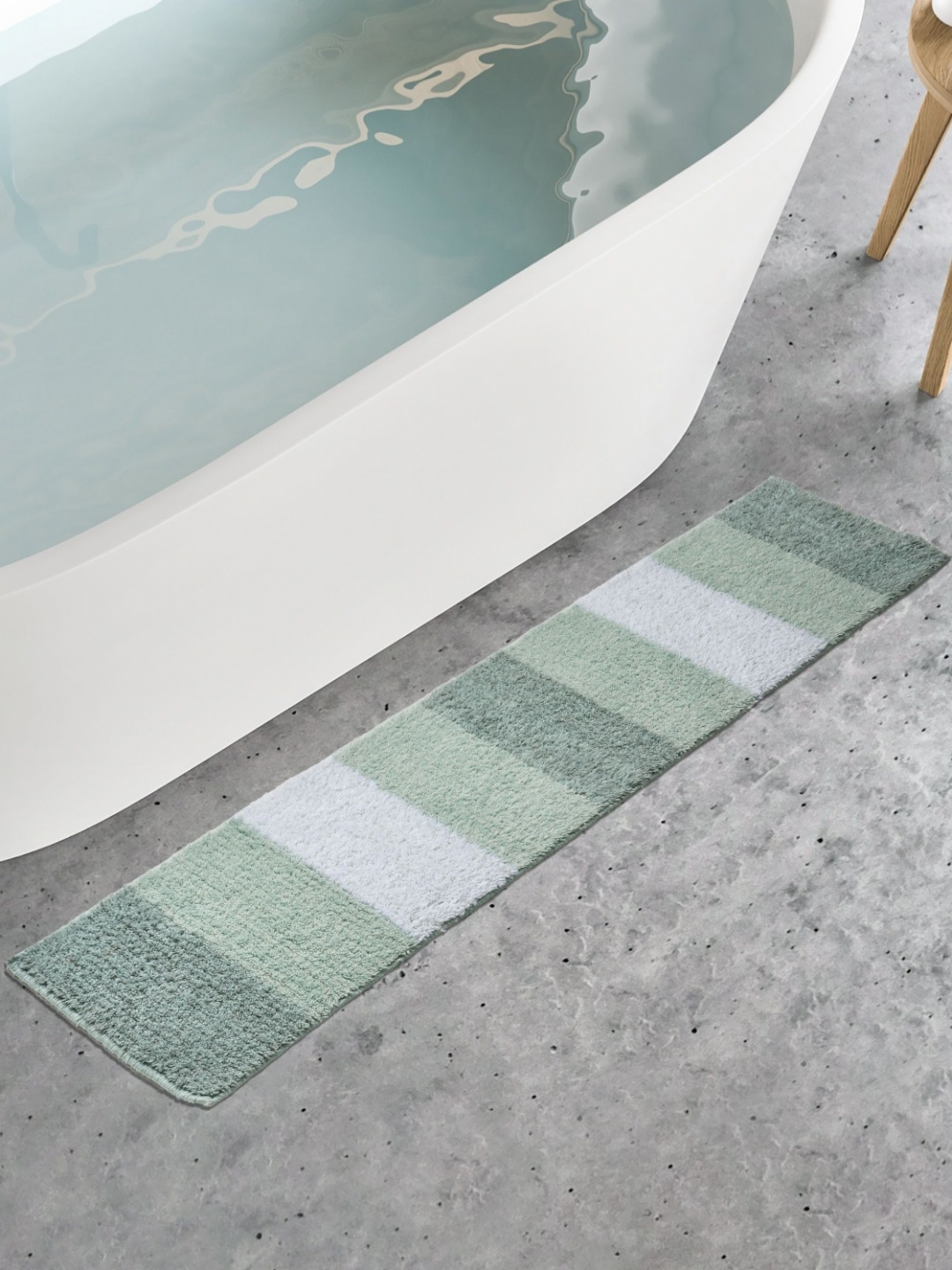 

Home Centre Pristine Melange Green and White Stripes Bath Runner