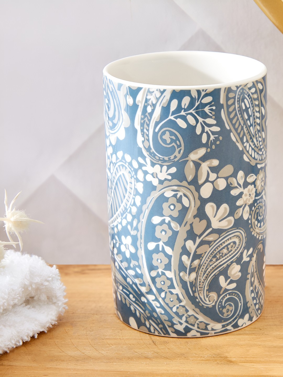 

Home Centre Mekong Kalmyk White & Blue Ethnic Motifs Printed Ceramic Toothbrush Holder