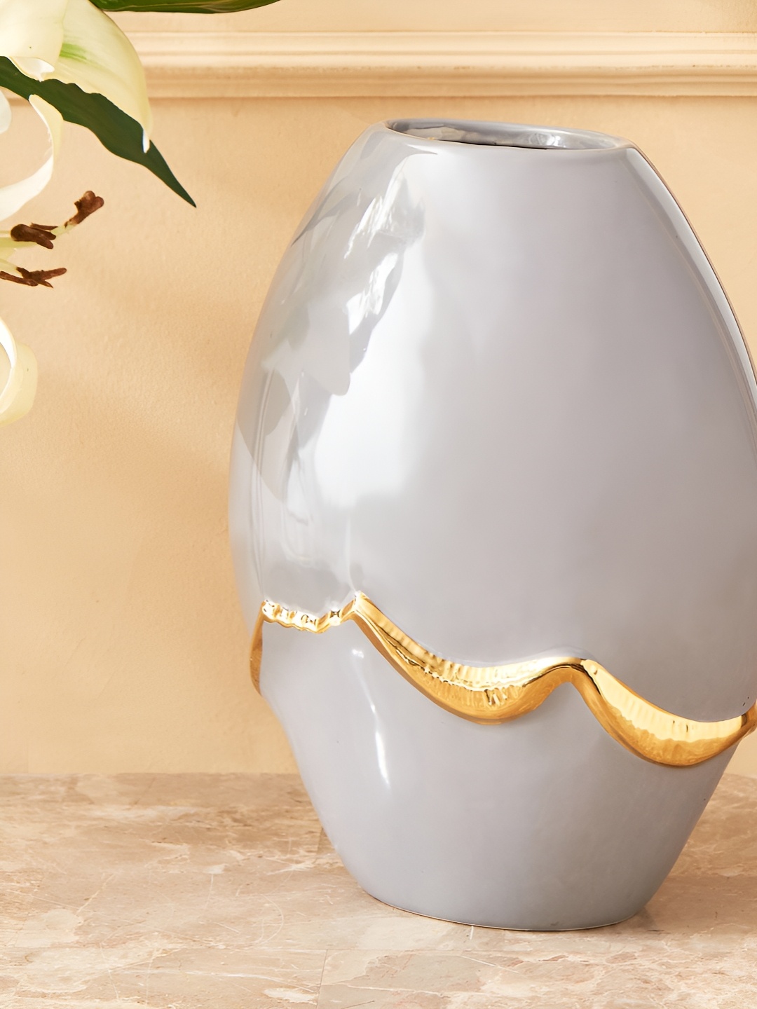 

Home Centre Grey Ceramic Vase