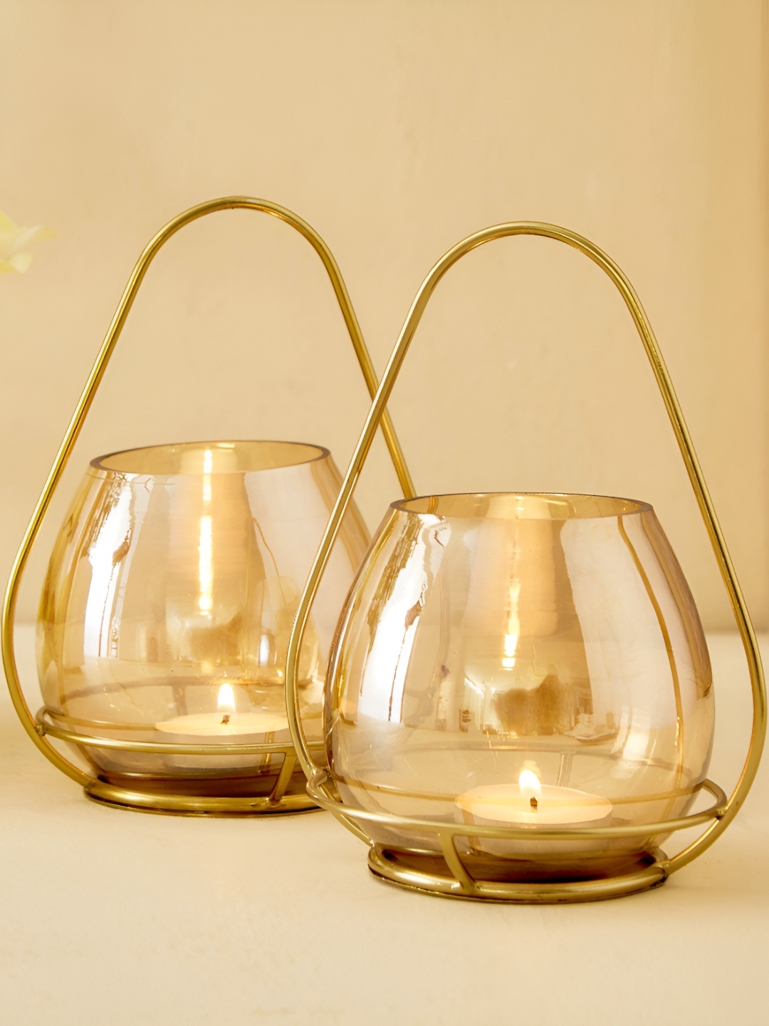 

Home Centre Raga Apurva GoldToned 2 Pieces T-Light Candle Holder, Gold