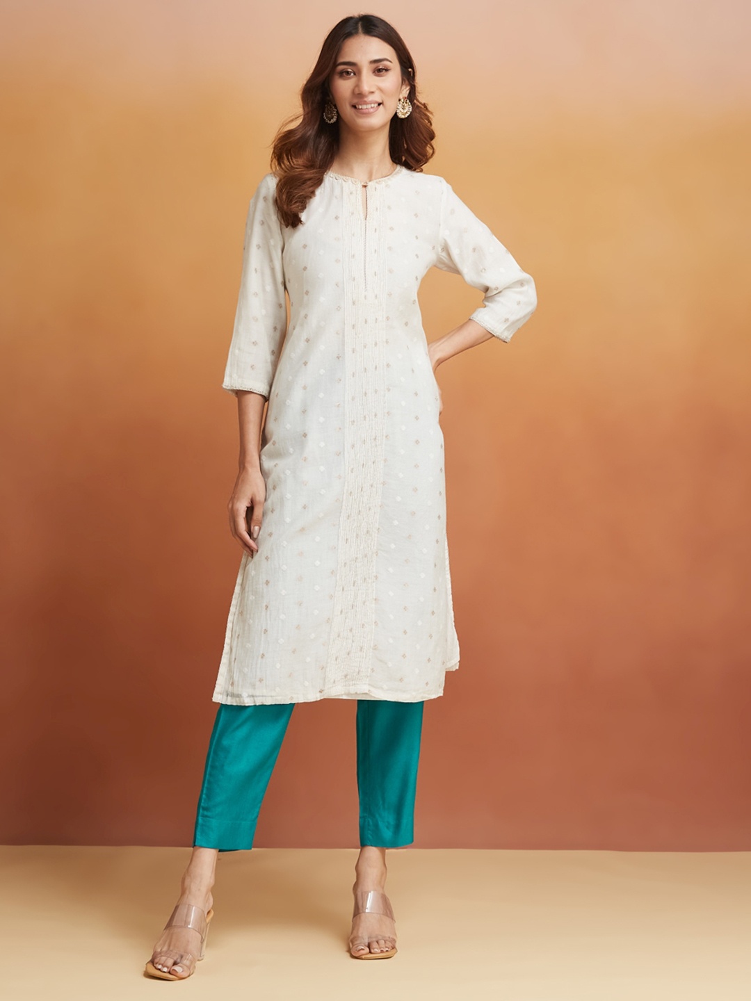 

Fabindia Women Pleated Solid Trousers, Blue