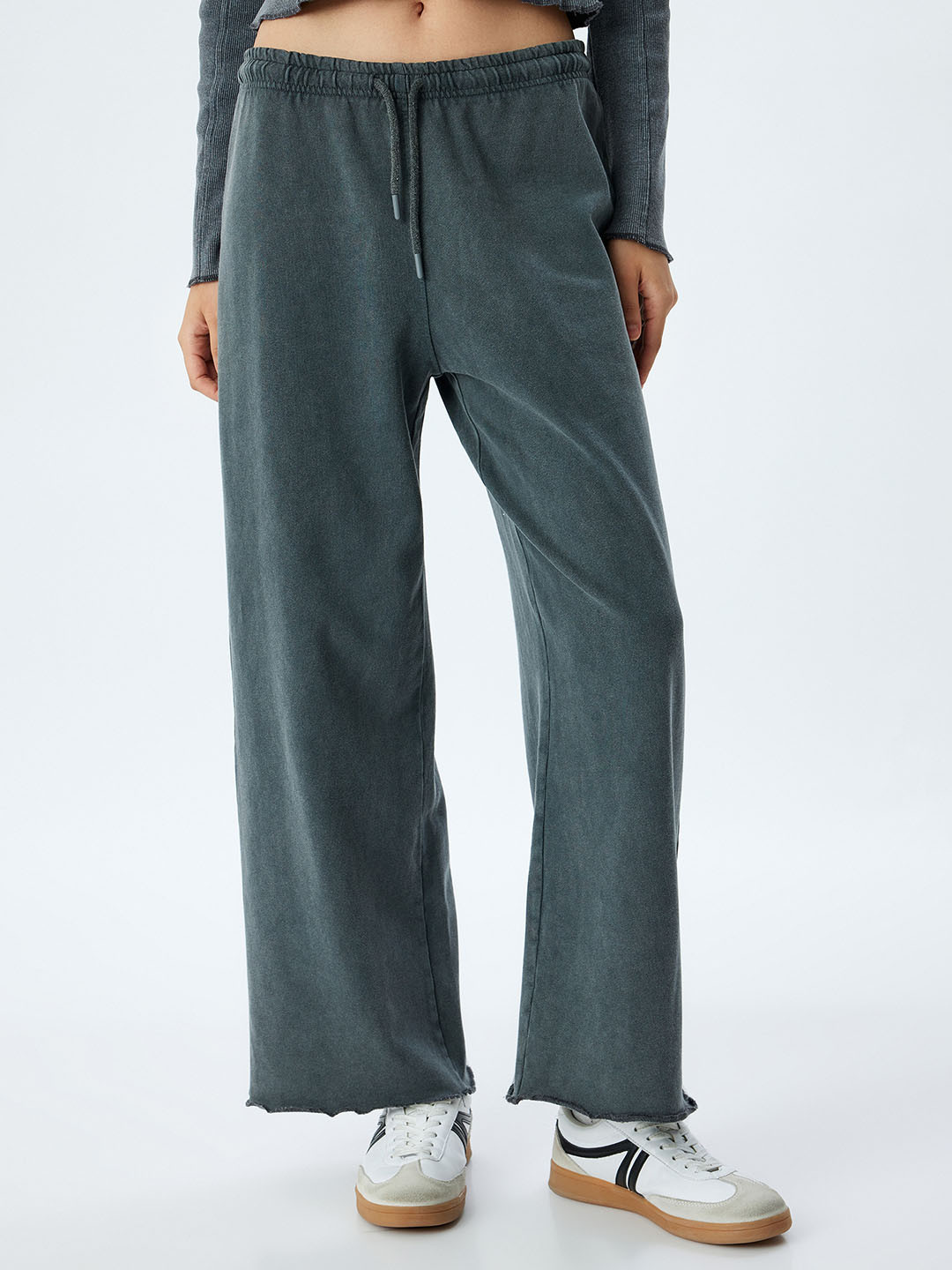 

Koton Women Solid Mid-Rise Regular Fit Cotton Parallel Trousers, Blue