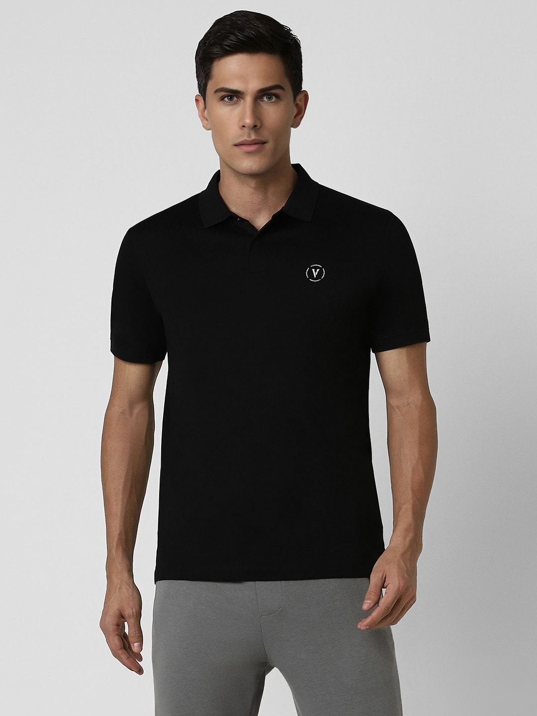 

Van Heusen Flex Men Solid Polo Collar Cotton T-shirt, Black