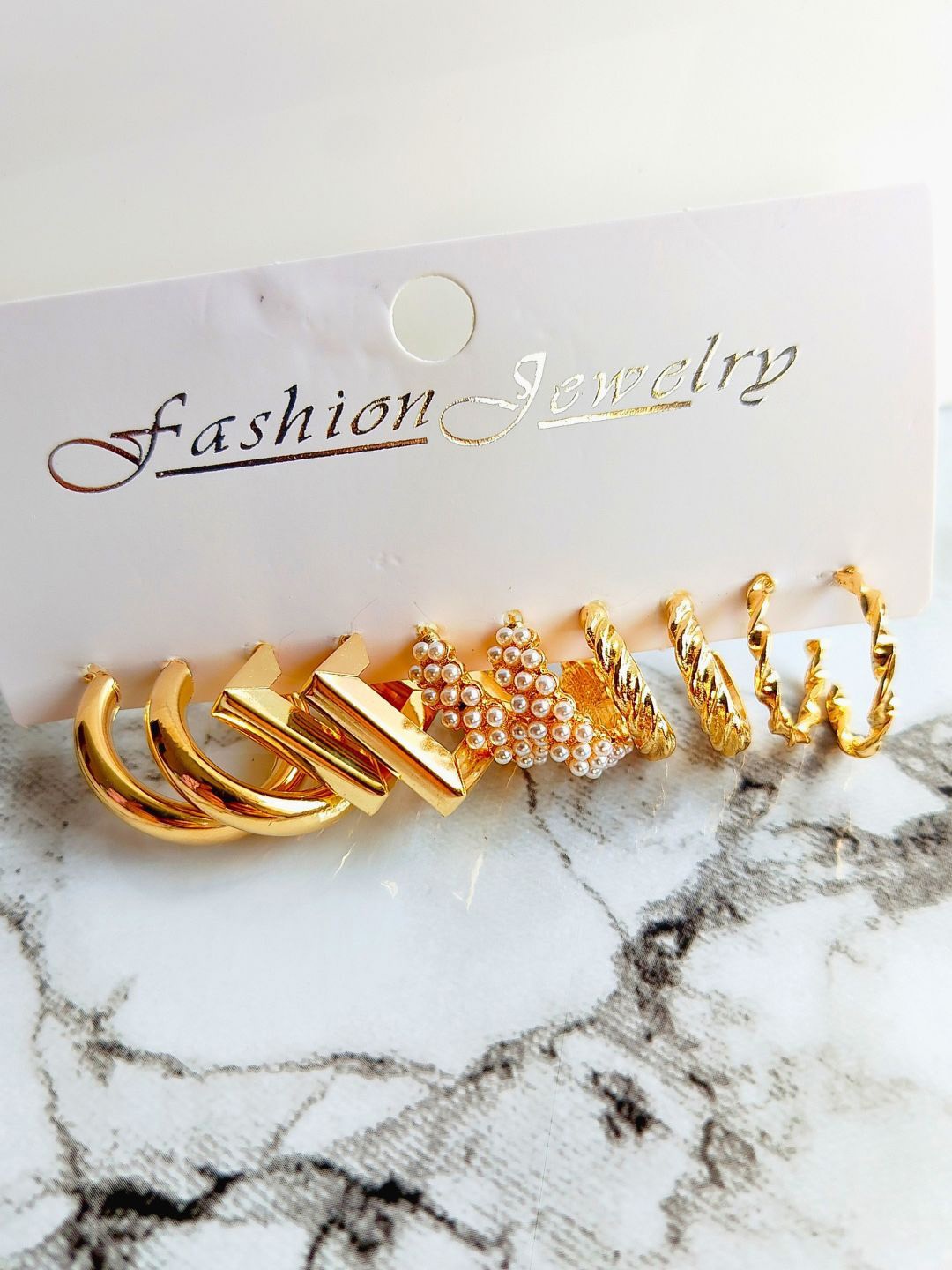 

DressBerry Set Of 5 Gold Toned Contemporary Hoop Earrings