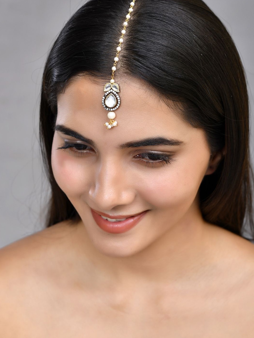 

Silvermerc Designs Gold Plated Pearls Studded Maang Tikka