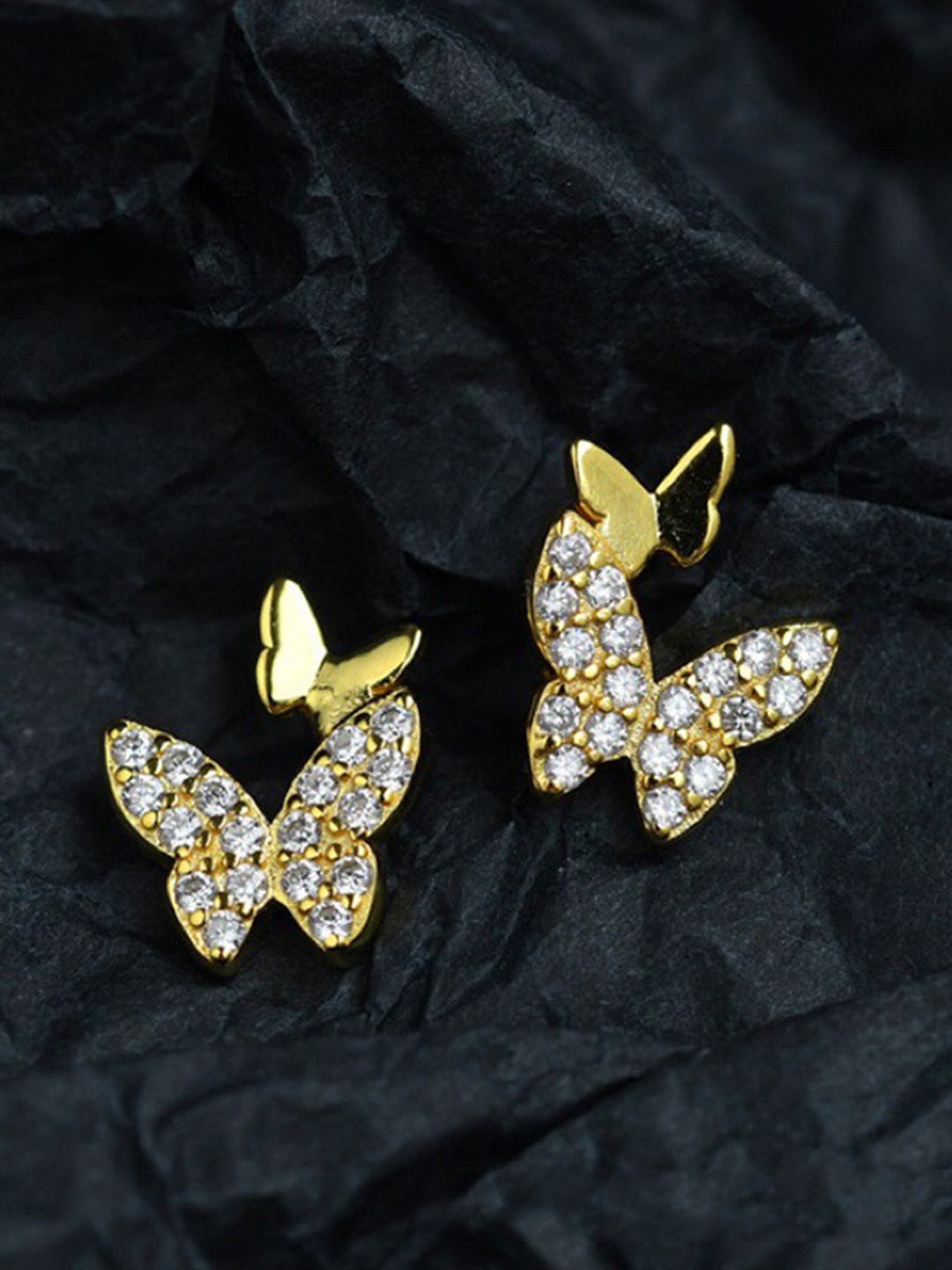 

VAGHBHATT Gold Plated Cubic Zirconia Studded Butterfly Shaped Studs Earrings