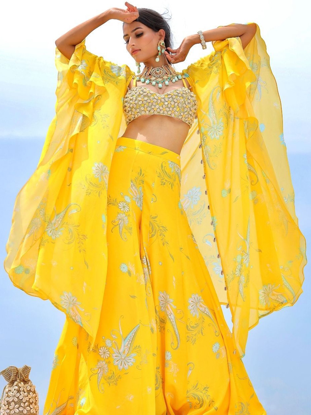 

Foram patel Yellow Cowrie Embroidered Cape Sharara Set
