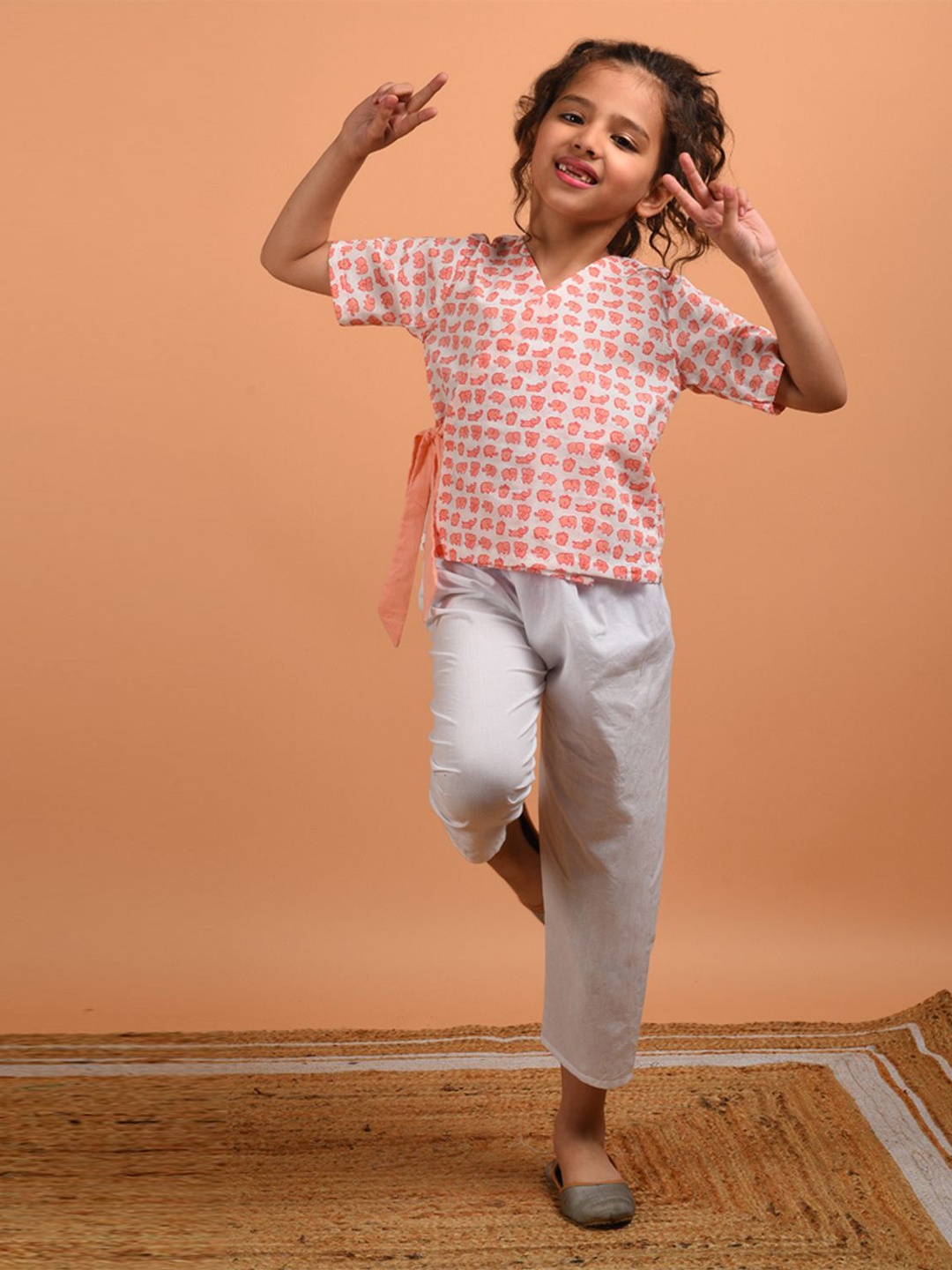 

Kalp Girls Conversational Printed Round Neck Cotton Top, Peach