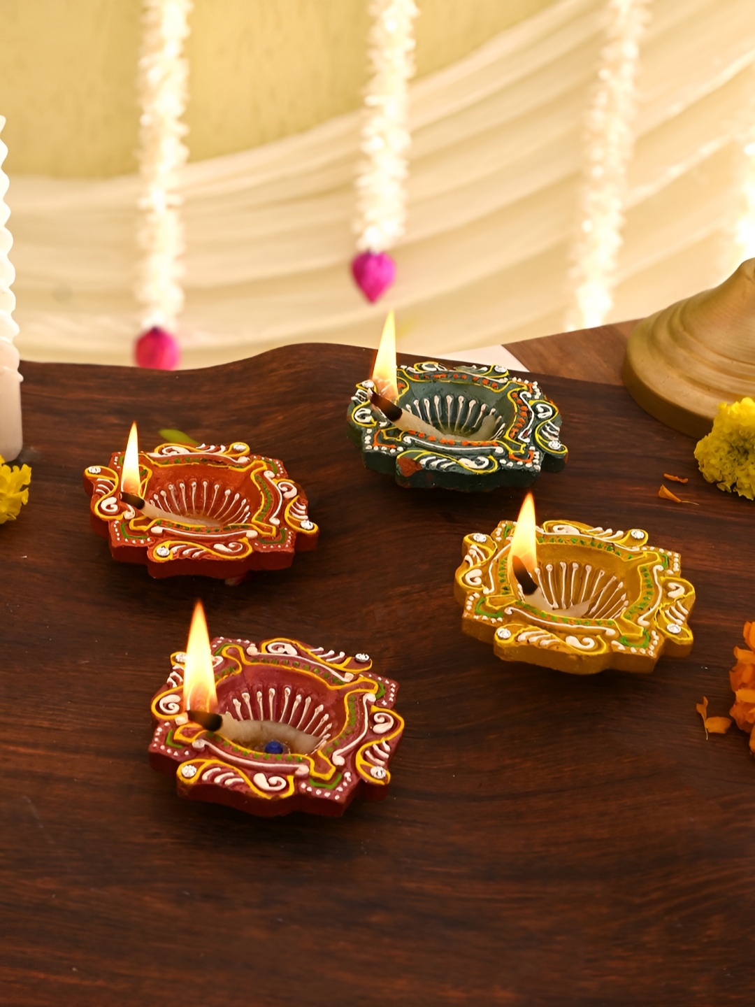 

Aura Blue & Green 4 Pieces Floral Printed Terracotta Diyas