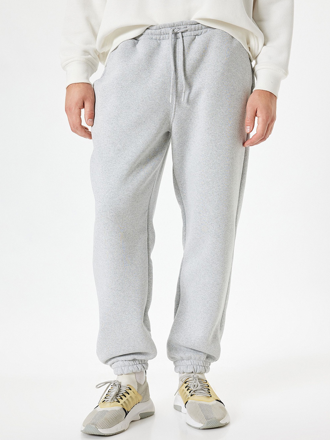 

Koton Men Mid-Rise Regular Fit Jogger, Grey melange