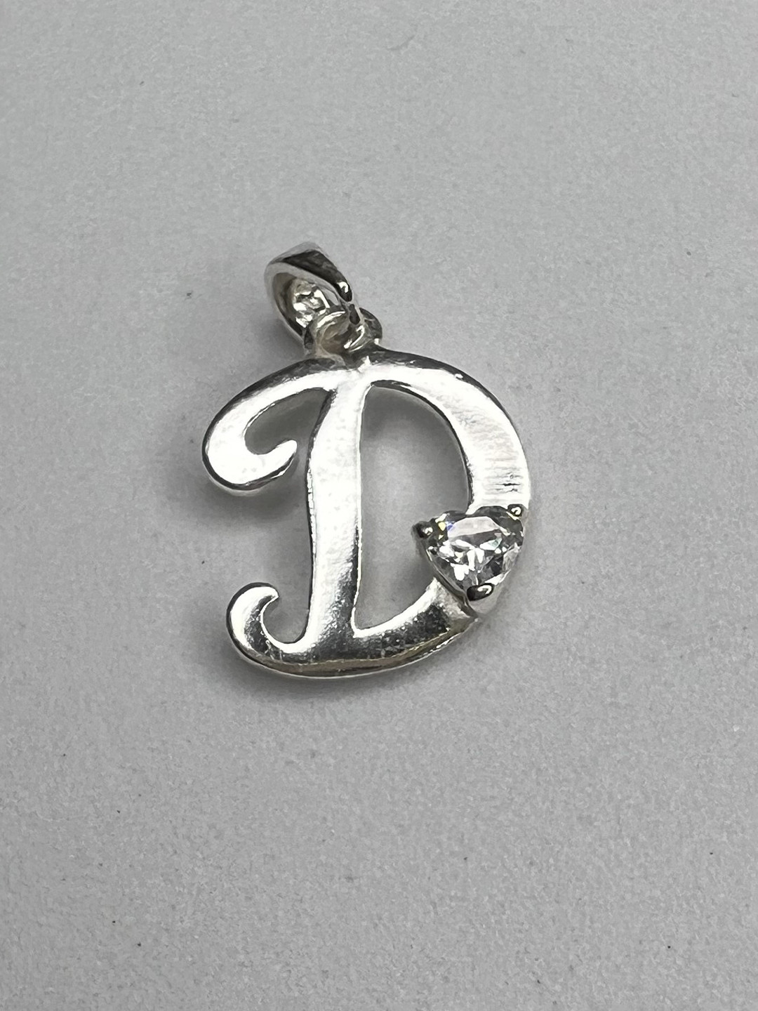 

Arte Jewels Cubic Zirconia Studded Contemporary Pendant, Silver