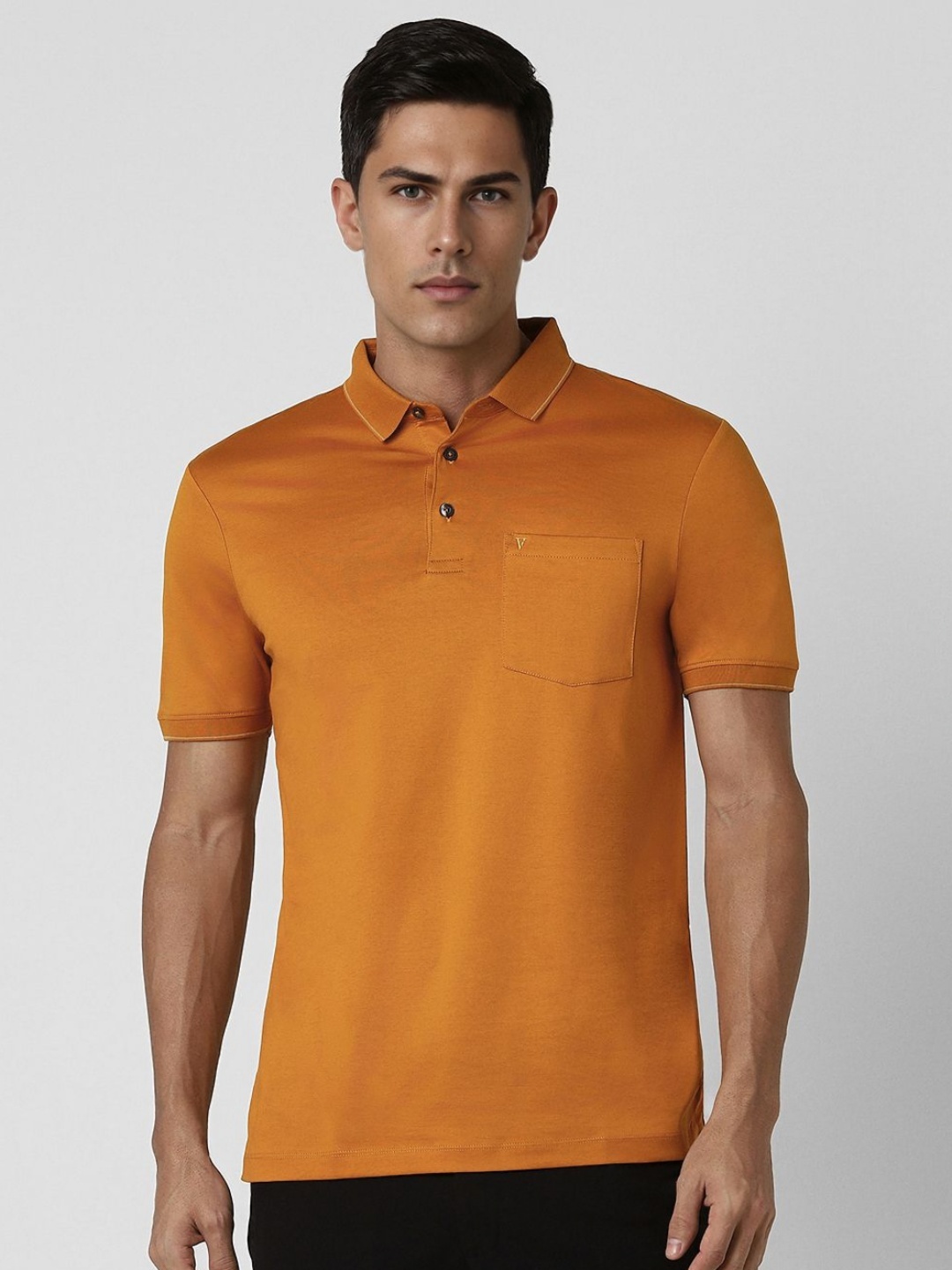 

Van Heusen Men Solid Polo Collar Cotton T-shirt, Orange