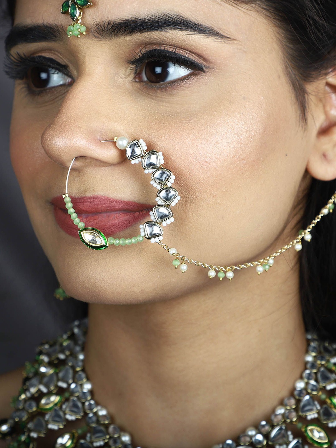 

BeAbhika Gold-Plated Kundan Studded & Beaded Chained Nosepin