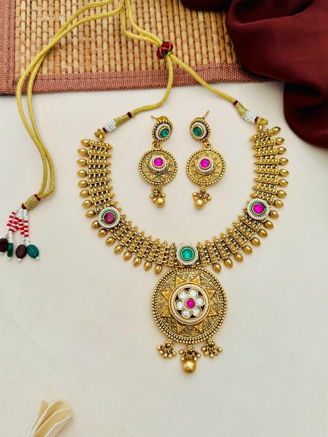 

ABDESIGNS Sophisticated Gold-Plated Kundan Kempstone Studded & Beaded Jewellery Set