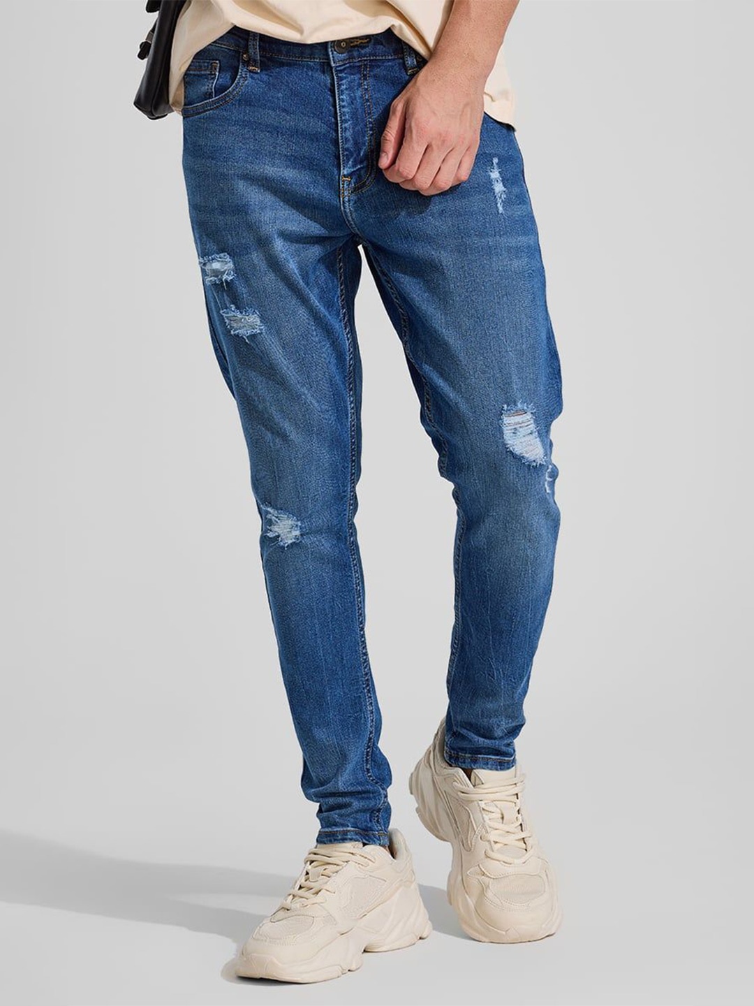 

Snitch Men Narrow Skinny Fit Mildly Distressed Light Fade Stretchable Jeans, Blue