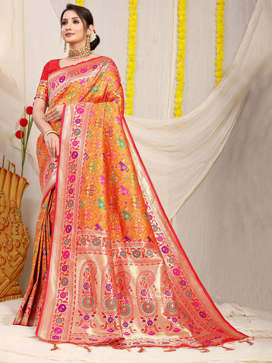 

Royal Rajgharana Saree Woven Design Zari Pure Silk Patola Sarees, Orange