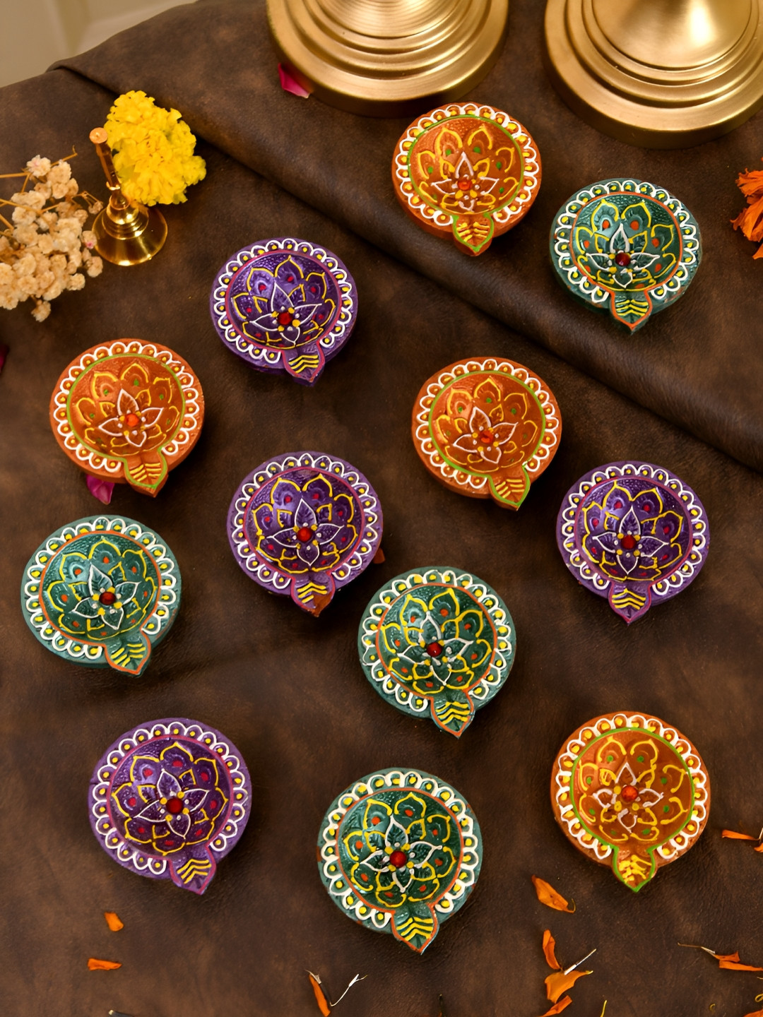 

Aapno Rajasthan Green & Purple 12 Pieces Lotus Motif Printed Terracotta Diyas