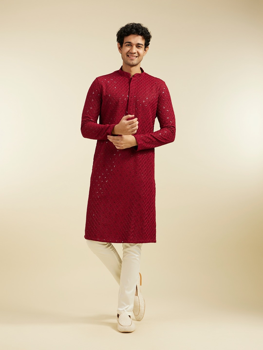 

Diwas by Manyavar Men Ethnic Motifs Embroidered Mandarin Collar Sequinned Straight Kurta, Maroon